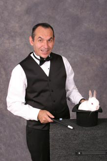 *Comedy magician